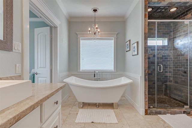 bathroom with independent shower and bath, crown molding, vanity, and a notable chandelier