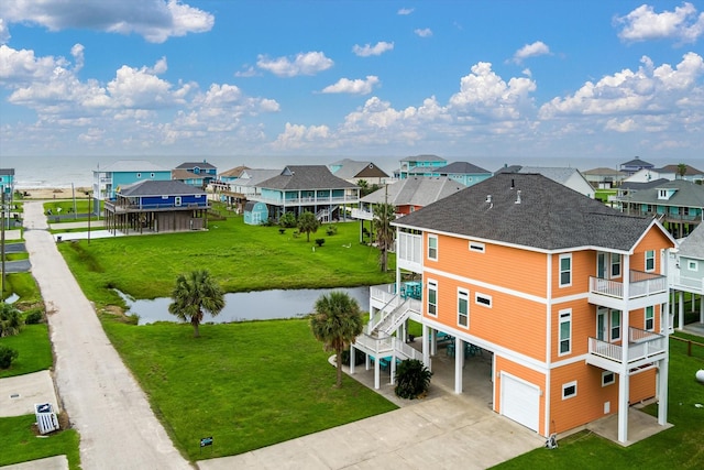 drone / aerial view with a water view