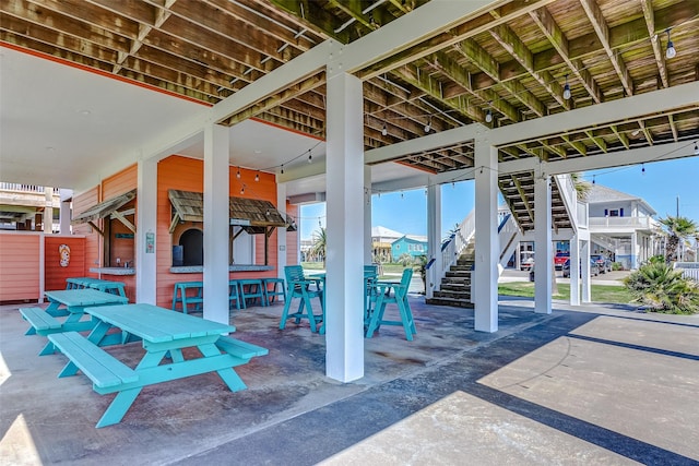 view of patio with an outdoor bar