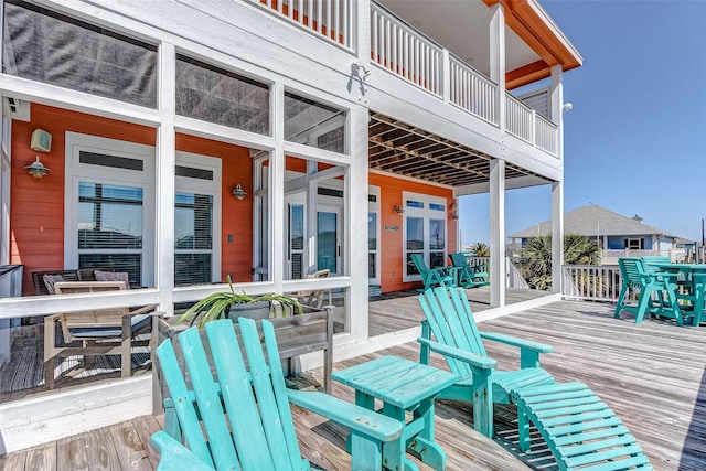 wooden deck featuring french doors