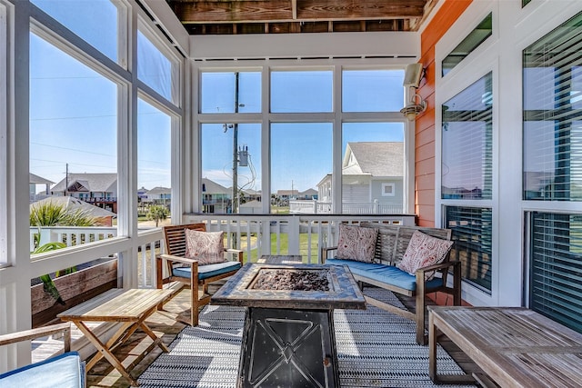 sunroom featuring a healthy amount of sunlight