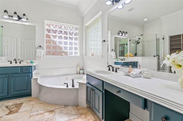 bathroom with vanity, ornamental molding, and separate shower and tub