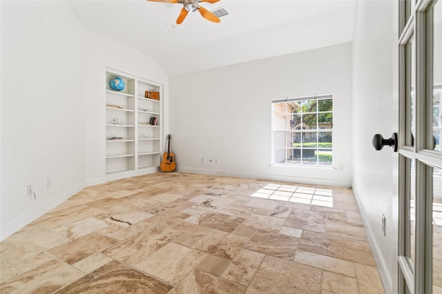 unfurnished room with vaulted ceiling, built in features, and ceiling fan