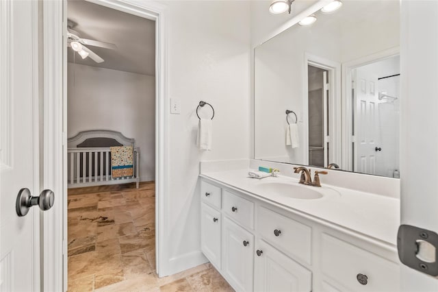 bathroom featuring vanity and ceiling fan