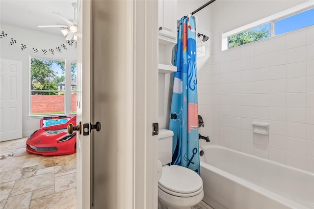 bathroom with shower / bath combination with curtain, ceiling fan, and toilet