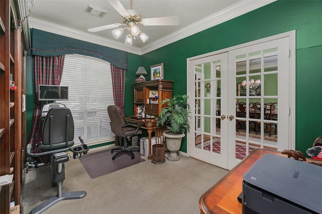 carpeted office space featuring ornamental molding, french doors, and ceiling fan