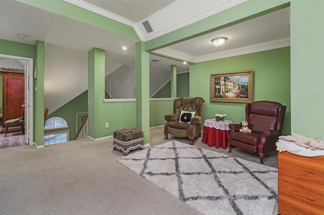 sitting room featuring vaulted ceiling, ornamental molding, and carpet flooring