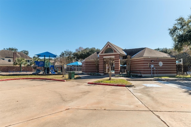 view of front facade featuring a playground