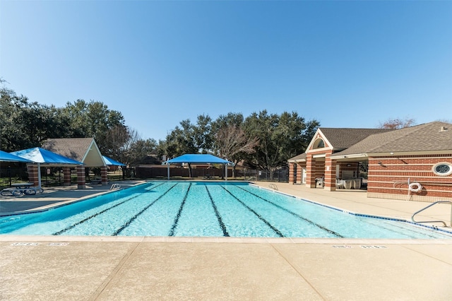 view of swimming pool featuring a patio