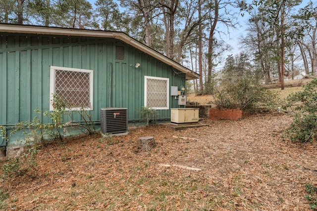 view of home's exterior with central air condition unit