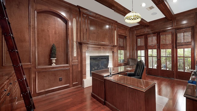 office area featuring wood walls, dark wood-type flooring, beam ceiling, and french doors