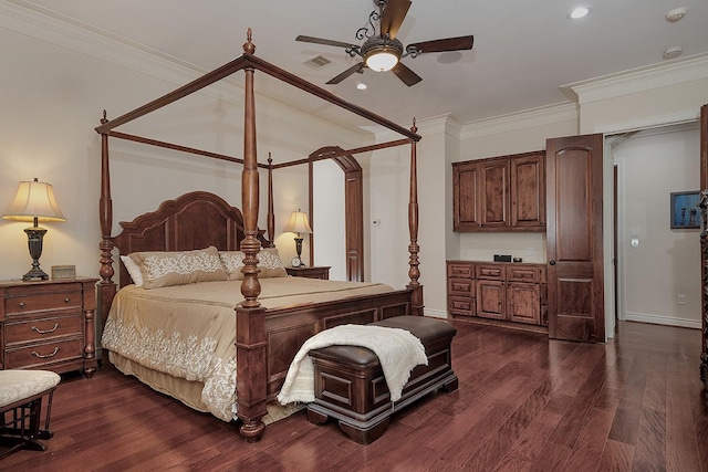 bedroom featuring ceiling fan, ornamental molding, and dark hardwood / wood-style floors