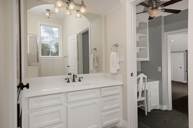 bathroom with ceiling fan and vanity