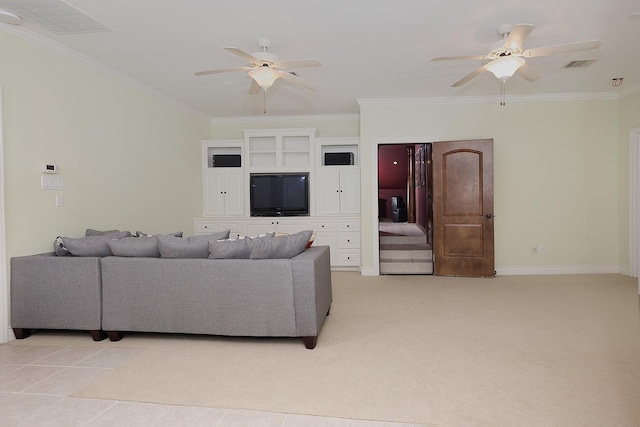 carpeted living room featuring ornamental molding