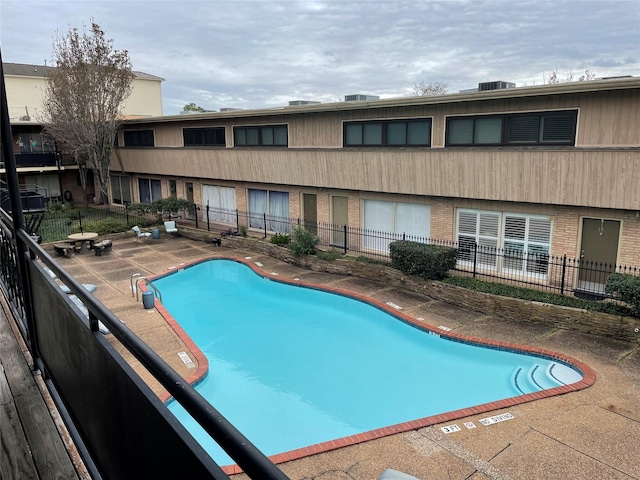 3809 N Braeswood Blvd Unit 24, Houston, TX 77025 - view of swimming pool featuring a patio
