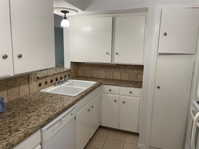 3809 N Braeswood Blvd Unit 24, Houston, TX 77025 - kitchen with white dishwasher, sink, backsplash, and white cabinets