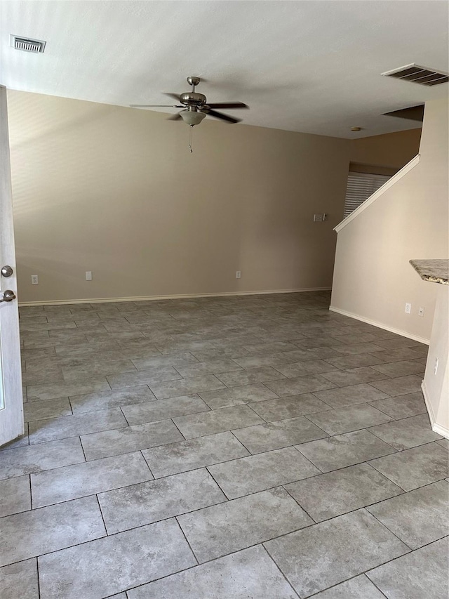 empty room featuring ceiling fan