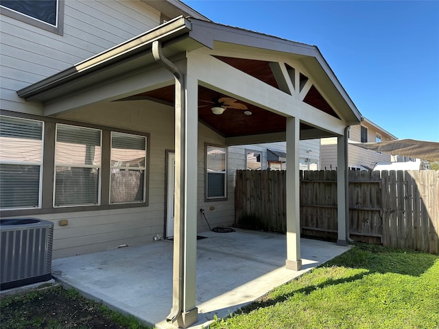 view of patio with ceiling fan and central AC unit