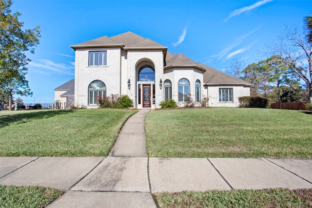 view of front of house with a front lawn