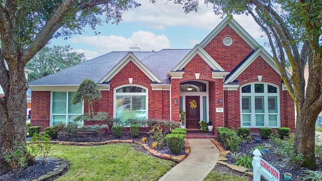 view of front of property with a front lawn