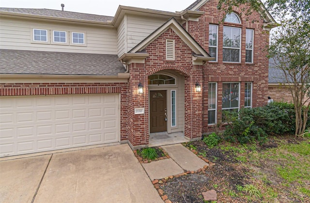 view of front of property featuring a garage