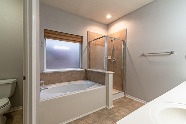 bathroom with toilet and separate shower and tub