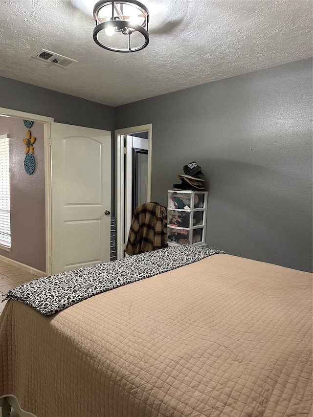 bedroom with a textured ceiling