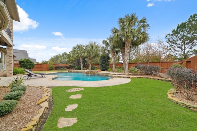 view of swimming pool with pool water feature, a patio area, and a lawn