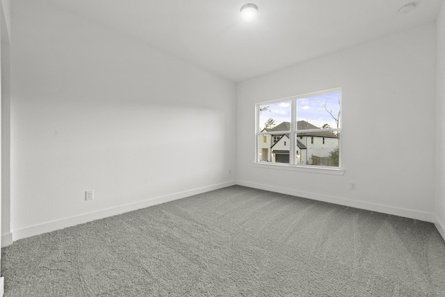 empty room featuring carpet flooring