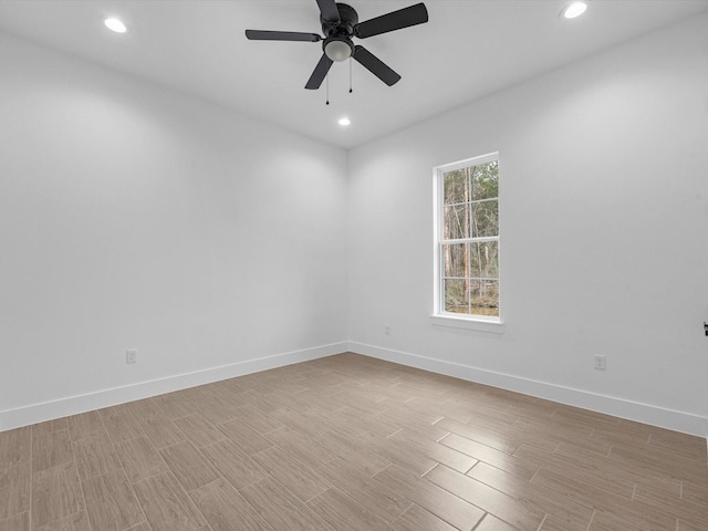 spare room with ceiling fan