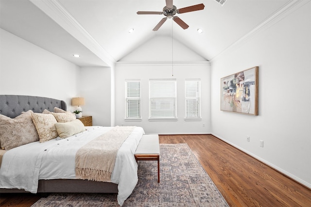 bedroom featuring crown molding, lofted ceiling, ceiling fan, and dark hardwood / wood-style flooring