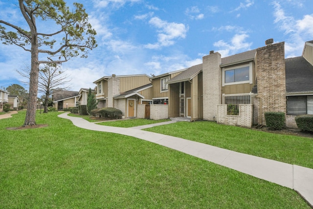 exterior space with a lawn