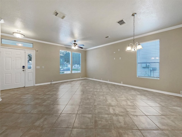 tiled foyer entrance featuring ceiling fan with notable chandelier, a textured ceiling, and crown molding