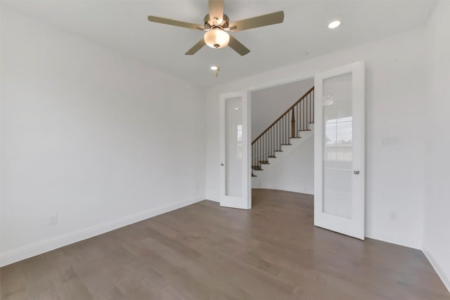 13115 Brookwood Bend Ln, Conroe, TX 77302 - empty room with ceiling fan, wood finished floors, baseboards, stairs, and recessed lighting