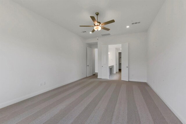 13115 Brookwood Bend Ln, Conroe, TX 77302 - unfurnished bedroom featuring light colored carpet, baseboards, recessed lighting, and a ceiling fan