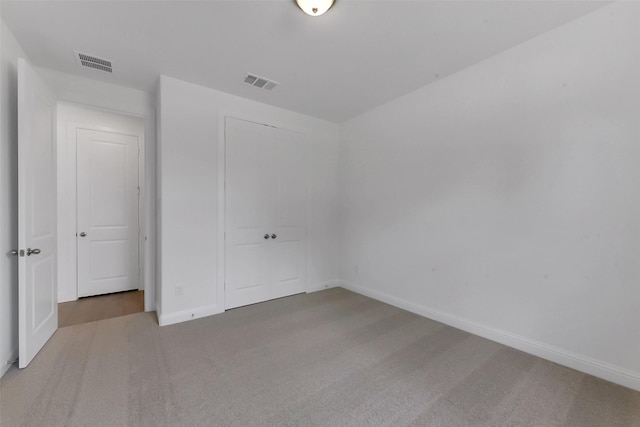 13115 Brookwood Bend Ln, Conroe, TX 77302 - unfurnished bedroom featuring carpet flooring, a closet, and baseboards