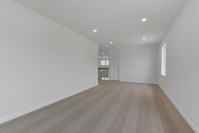 13115 Brookwood Bend Ln, Conroe, TX 77302 - unfurnished room with light colored carpet, baseboards, and recessed lighting