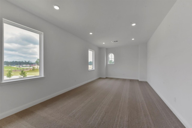13115 Brookwood Bend Ln, Conroe, TX 77302 - carpeted spare room featuring recessed lighting and baseboards
