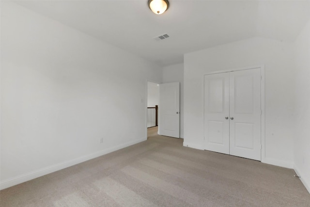 13115 Brookwood Bend Ln, Conroe, TX 77302 - unfurnished bedroom featuring light colored carpet, a closet, and baseboards