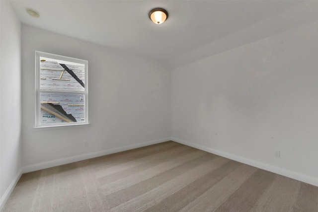 13115 Brookwood Bend Ln, Conroe, TX 77302 - empty room featuring carpet floors and baseboards