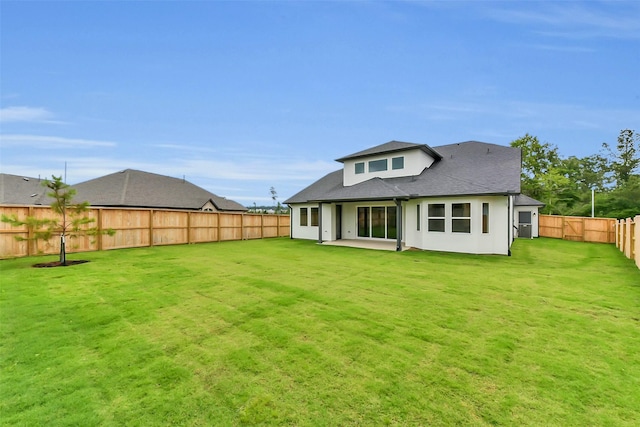 13115 Brookwood Bend Ln, Conroe, TX 77302 - back of property featuring a patio and a shingled roof