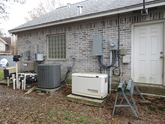 exterior details featuring central AC unit