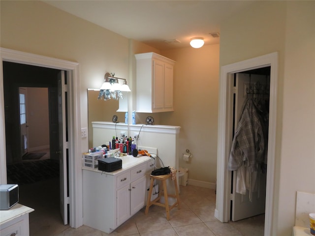 bathroom with tile patterned flooring