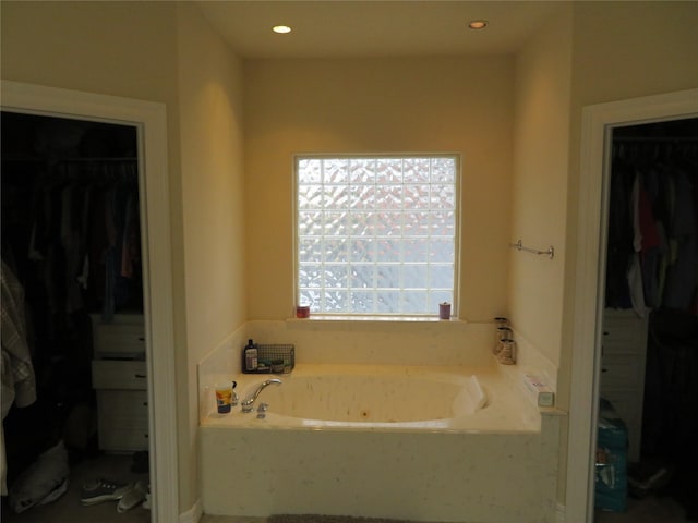 bathroom featuring a washtub