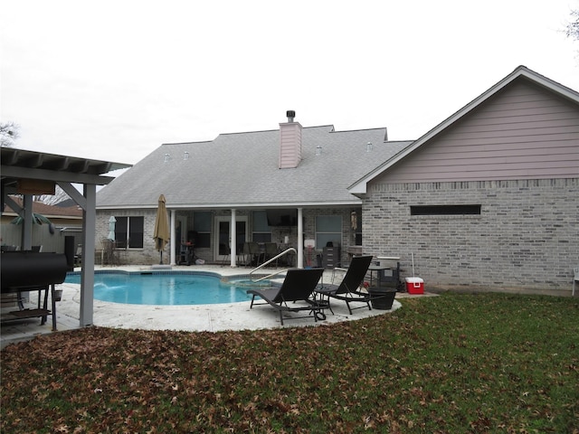 back of house featuring a patio area