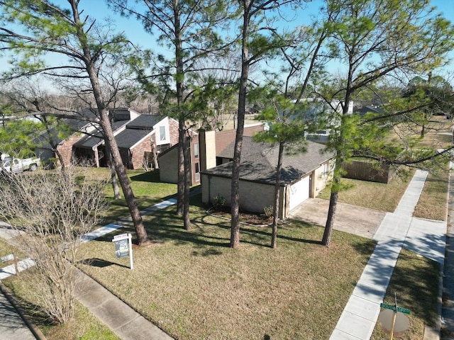 view of yard featuring a garage