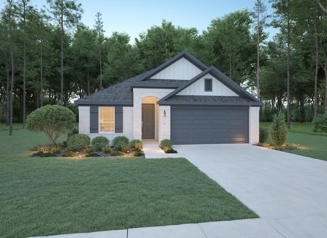 view of front of home with a front lawn and a garage