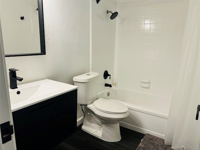 full bathroom with wood-type flooring, toilet, vanity, and shower / tub combo with curtain