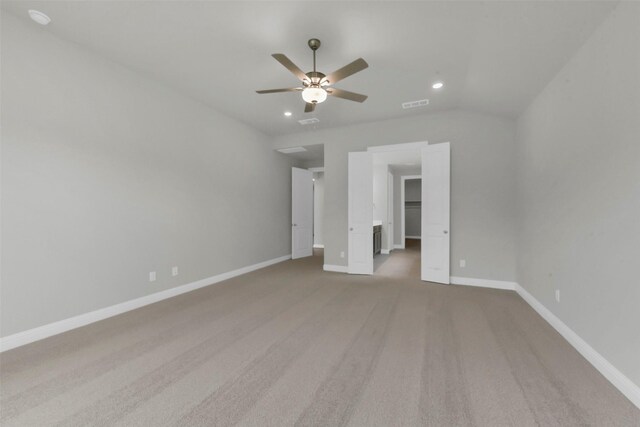 16163 Sheridan River Trl, Conroe, TX 77302 - unfurnished bedroom featuring a walk in closet, baseboards, recessed lighting, carpet floors, and a ceiling fan