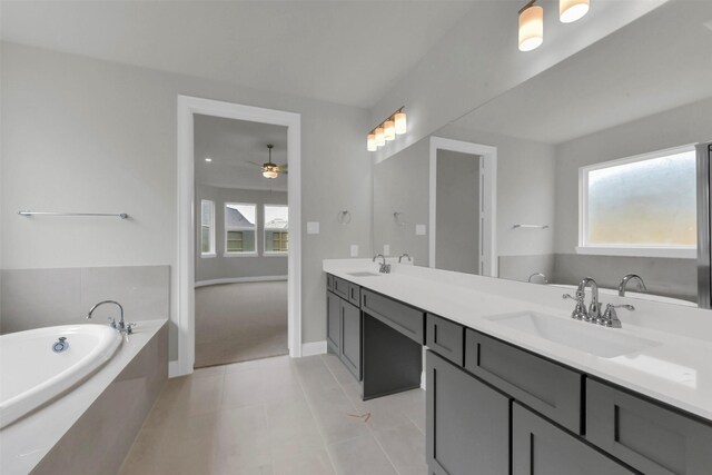 16163 Sheridan River Trl, Conroe, TX 77302 - full bathroom featuring a bath, plenty of natural light, and tile patterned flooring